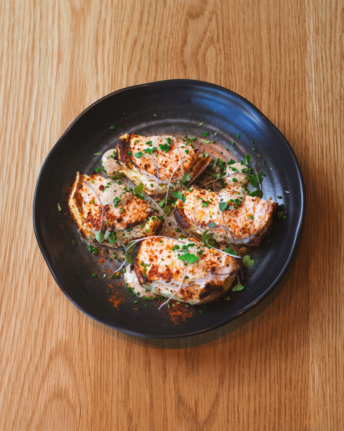 Crisp dumplings with herbs served at an Alma pop-up